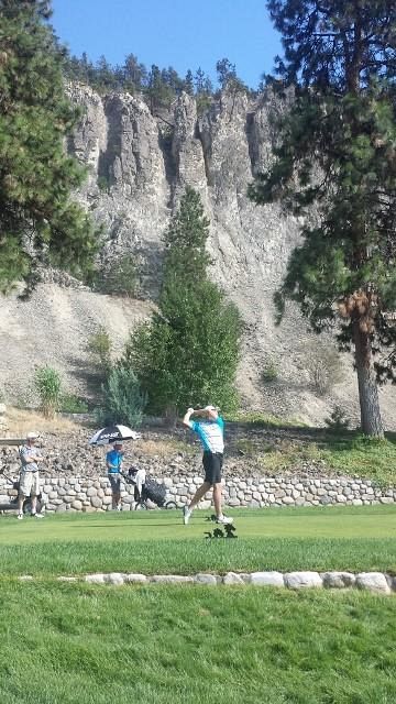 Keenan Hall hits his tee shot on the 12th