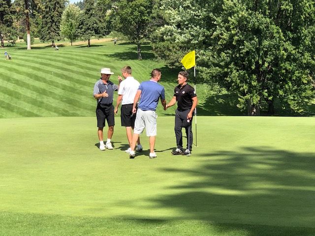 Shaking hands on the final hole