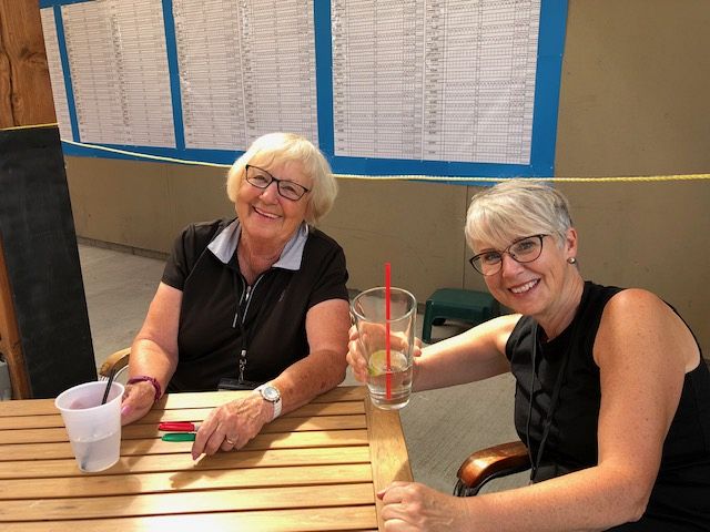 Pat and Deborah tabulating scores