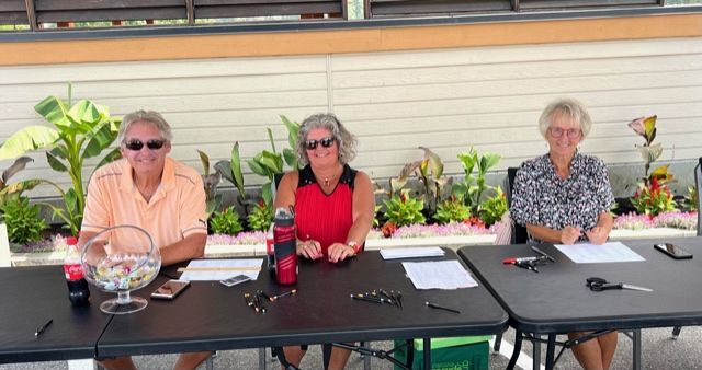 Dave Corlee and Judy at the Scoring Table